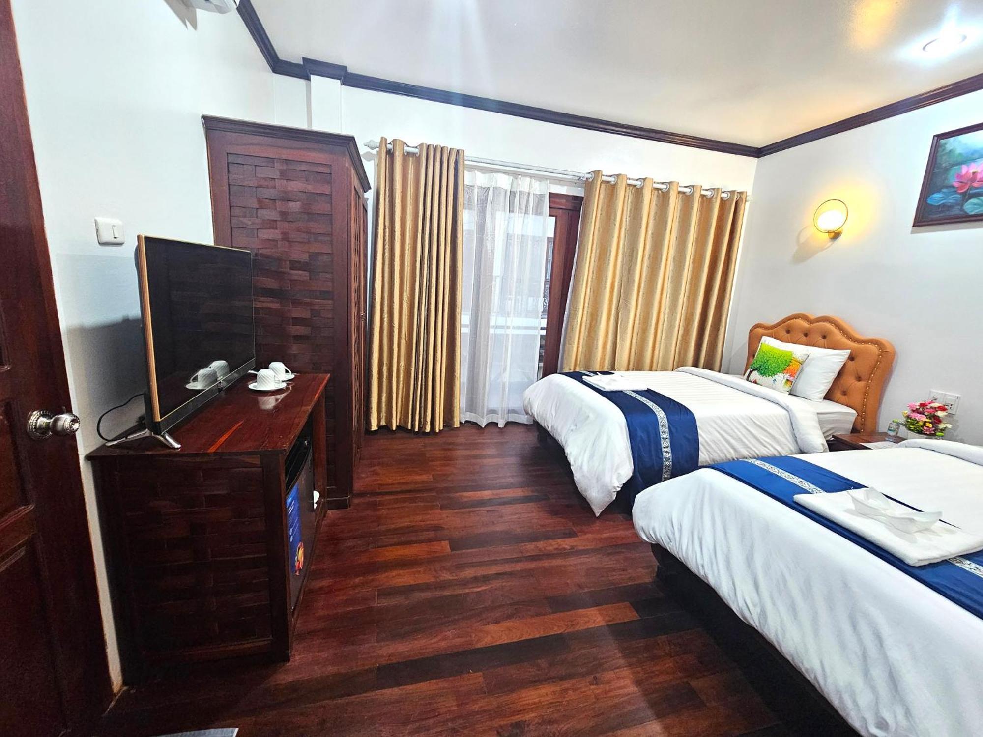 Win Hotel Vang Vieng Exterior photo