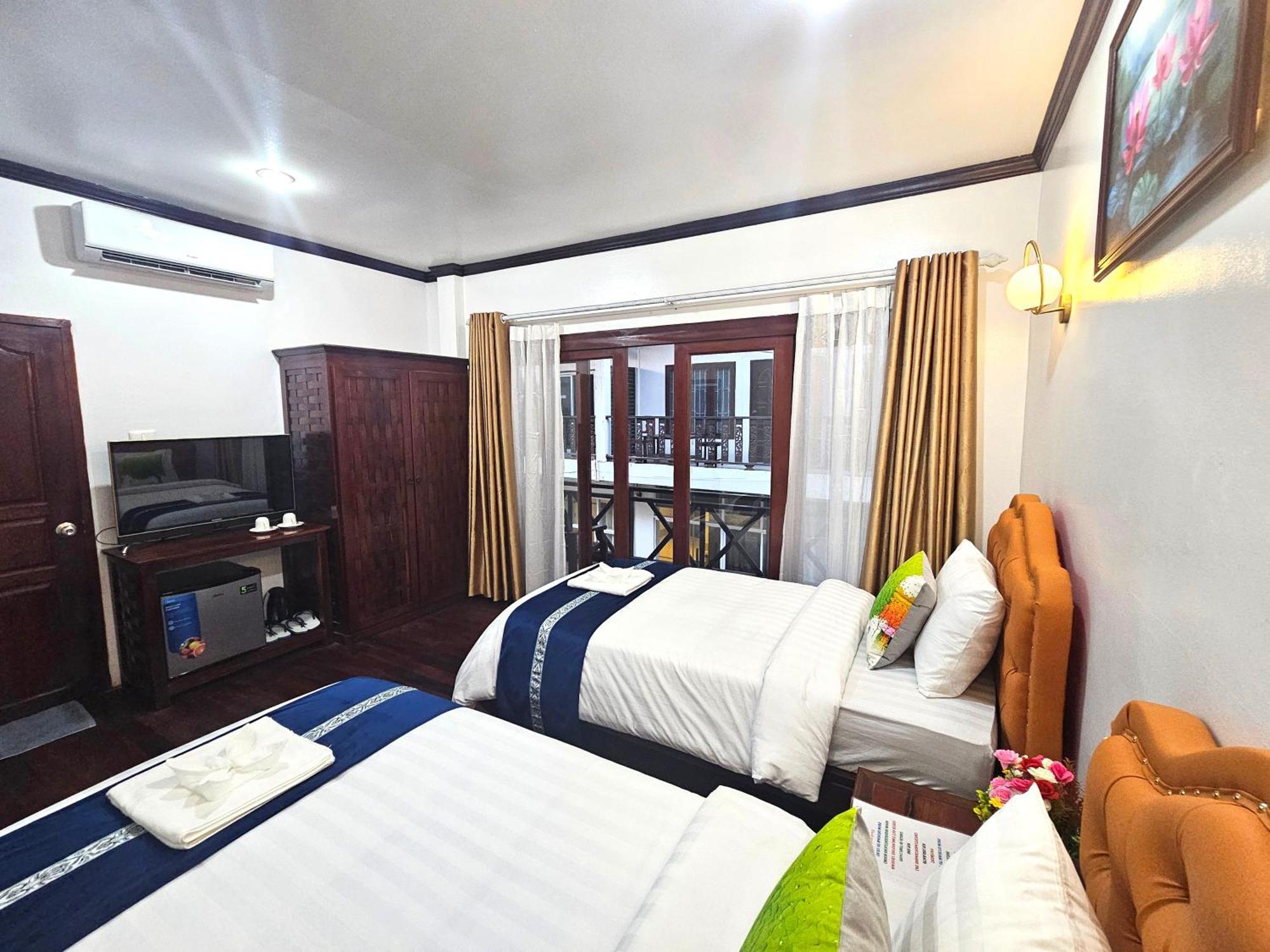 Win Hotel Vang Vieng Exterior photo