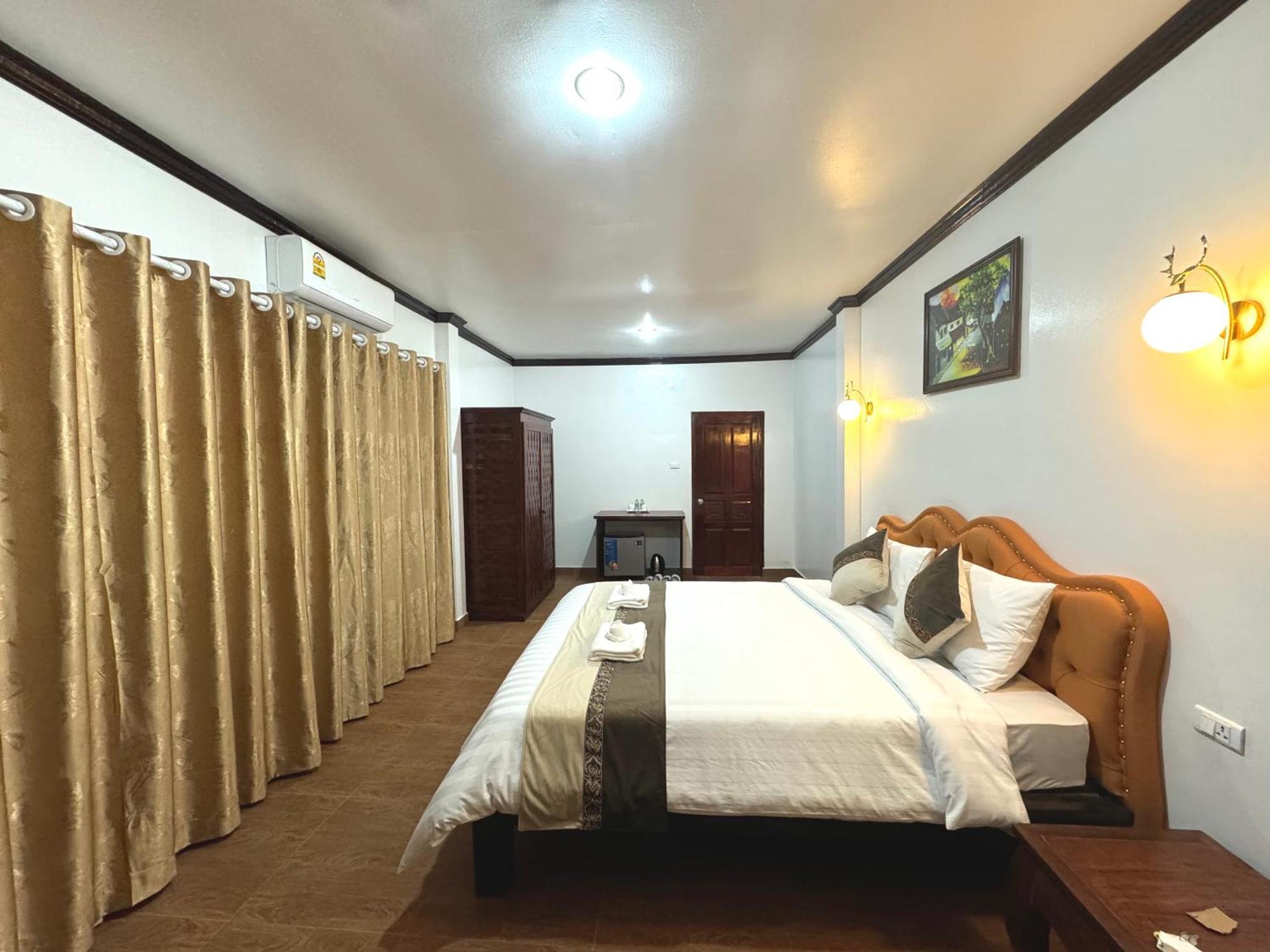 Win Hotel Vang Vieng Exterior photo